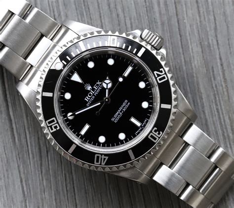 rolex submariner 14060m 2 liner vs 4 leiner|rolex 14060m 2 line vs 4 line.